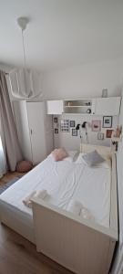 Postel nebo postele na pokoji v ubytování Apartments Mari