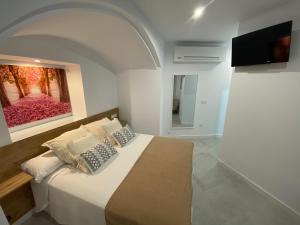 מיטה או מיטות בחדר ב-Casa Estudio Trujillo