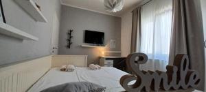 Postel nebo postele na pokoji v ubytování Apartments Mari