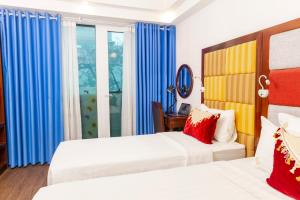 Voodi või voodid majutusasutuse Hanoi City Backpackers Hostel toas