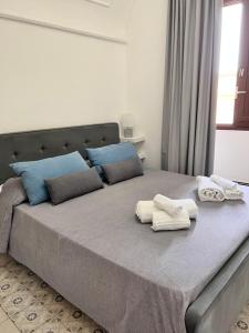 Postel nebo postele na pokoji v ubytování B&Beach Ospitalità Siciliana