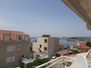 a view of the water from the balcony of a building at Madunić in Podstrana