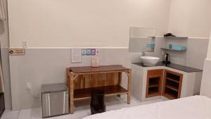 a small bathroom with a sink and a counter at Homestay Da Nang Full House in Da Nang +46 photos