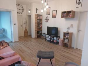 TV a/nebo společenská místnost v ubytování Apartment Mia 2