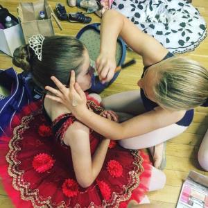 two young girls are sitting on the floor at BARBIE HOUSE ,OPPOSITE The BEACH & PIER ,2 GROUND FLOOR APARTMENTS each with Private Car space & Garden , Free Access next Door to the Stunning BALLET & MAKE UP SCHOOL & a Beautiful LADYS BEAUTY SALON in Paignton