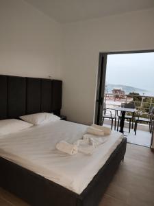 Postel nebo postele na pokoji v ubytování Petros rooms