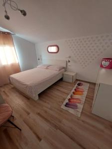 Postel nebo postele na pokoji v ubytování Apartment Mia 2