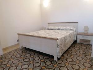 Postel nebo postele na pokoji v ubytování CASA VERDINA, nel cuore di Alghero