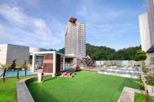 a rendering of a building with a lawn in front of it at The BEST @ Genting Highland ( FREE WIFI ) in Genting Highlands