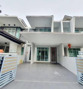 a large white house with a large patio at MODERN STYLISH 2STOREY HOUSE 8PAX@ALMA NEAR JUSCO in Bukit Mertajam