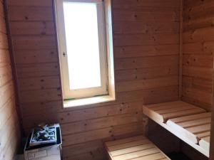 a room with a sauna with a window at Ruegen Fewo 66 2 in Kasnevitz