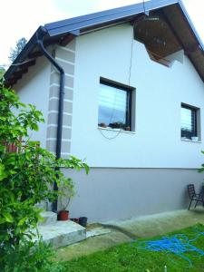 a house with a window on the side of it at DRAGICA Manastirska 10 in Ljubovija