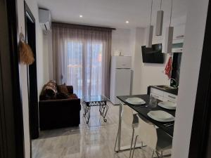 TV a/nebo společenská místnost v ubytování Christakis Luxury Apartment