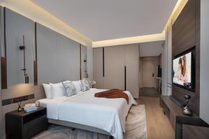 珠海Rezen Hotel Zhuhai HengQin Border and Exhibition Center Branch的相册照片