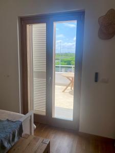 Postel nebo postele na pokoji v ubytování APulia casa e cucina + 23 fotografií