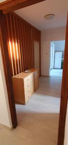 Posteľ alebo postele v izbe v ubytovaní Pine Tree Apartment