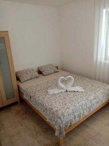 Voodi või voodid majutusasutuse Apartments Vuk&Jovan toas