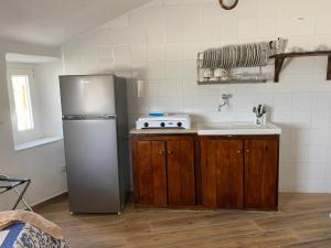 Villaggio La Roccia camping的厨房或小厨房