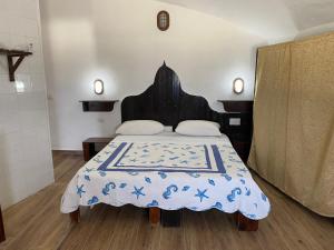Villaggio La Roccia camping客房内的一张或多张床位