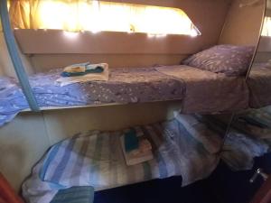 Postel nebo postele na pokoji v ubytování Barca Deliziosa