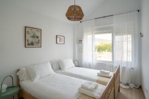 Posteľ alebo postele v izbe v ubytovaní Montealmar - Natural Stays Somo