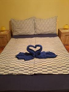 A bed or beds in a room at Ágnes Pihenőház