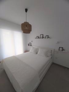 Łóżko lub łóżka w pokoju w obiekcie MAR & SAL Roquetas de Mar playa de las Salinas
