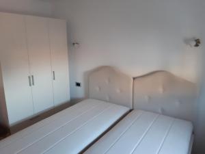 Postel nebo postele na pokoji v ubytování Glušac Lux