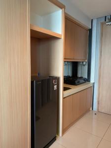 Køkken eller tekøkken på RoomQu at Apartment Tree Park