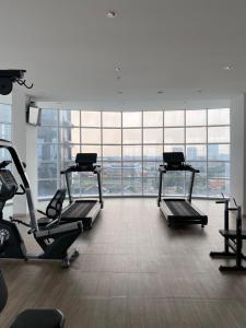 Fitnesscentret og/eller fitnessfaciliteterne på RoomQu at Apartment Tree Park