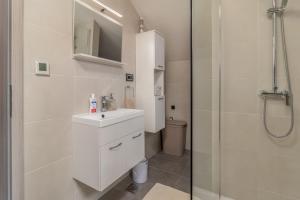 Koupelna v ubytování Aura Apartment + 28 fotografií