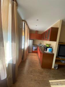 Кухня или мини-кухня в Central Apartment
 +1 фотография