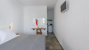 Postel nebo postele na pokoji v ubytování Michalis Studios