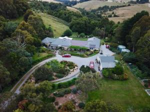 an aerial view of a house with a driveway at Llarrinda Bed & Breakfast in Foster