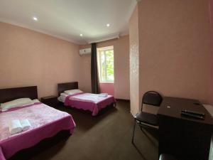 Voodi või voodid majutusasutuse Hotel Shalimar toas