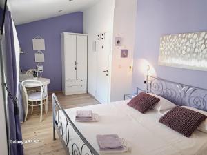 Heritage Rooms Kut客房内的一张或多张床位