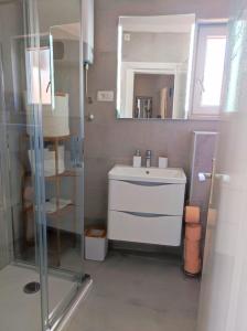 Koupelna v ubytování Kaleta + 28 fotografií