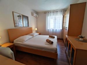 Postel nebo postele na pokoji v ubytování Kaleta