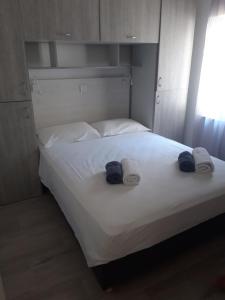 Posteľ alebo postele v izbe v ubytovaní VILLA LAURA