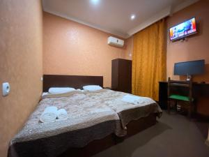 Voodi või voodid majutusasutuse Hotel Shalimar toas