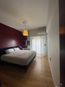 Llit o llits en una habitació de Athens Central Apartment