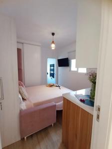 Postel nebo postele na pokoji v ubytování Marixa Room
