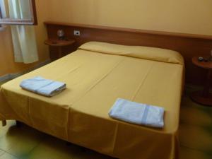 Кровать или кровати в номере Bed & Breakfast - Anselmi M&M