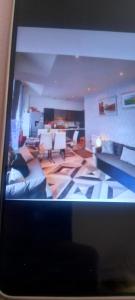 a view of a living room from a television screen at 2 bedrooms, 2 bathrm Leicester City Apartment, Central Location, sleeps 2 in Leicester