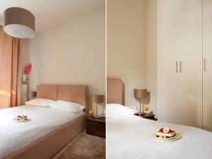 
Łóżko lub łóżka w pokoju w obiekcie Chopin Apartments - Capital
