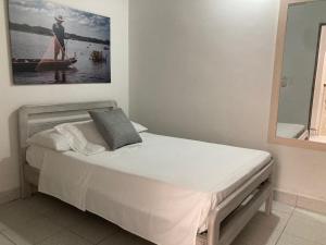 Postel nebo postele na pokoji v ubytování Hotel Casa de las Dos Palmas -Hotel Boutique