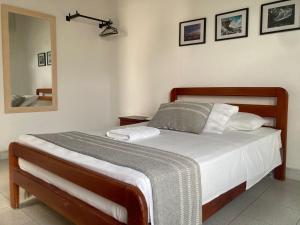 Postel nebo postele na pokoji v ubytování Hotel Casa de las Dos Palmas -Hotel Boutique