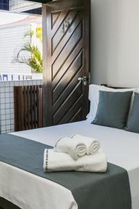 Postel nebo postele na pokoji v ubytování Hotel Pousada Porto da Lua