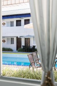 Bazén v ubytování Hotel Pousada Porto da Lua nebo v jeho okolí