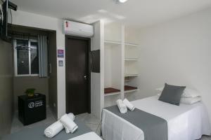 Postel nebo postele na pokoji v ubytování Hotel Pousada Porto da Lua